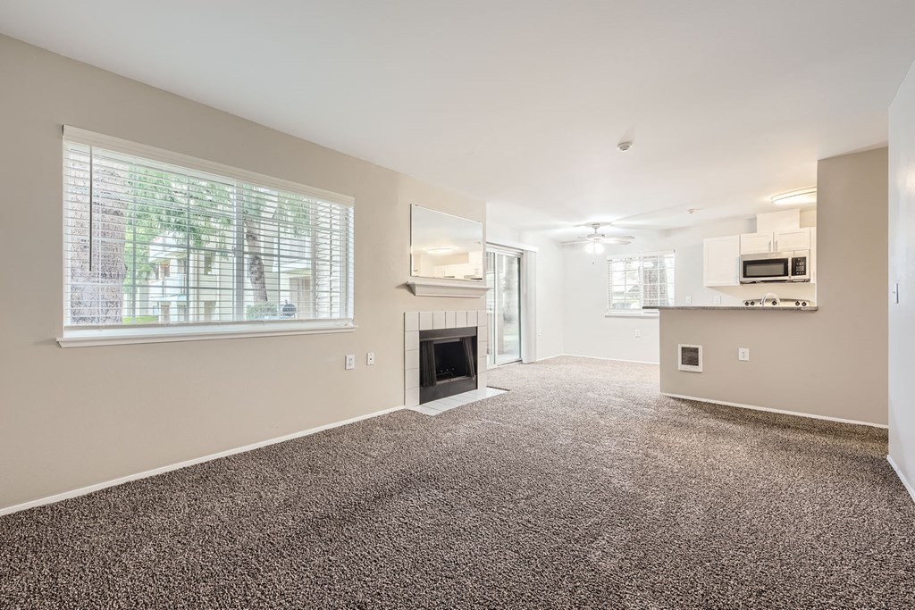 Living Room with Fireplace in a two-bedroom two-bath at Capitol City in Lacey, WA