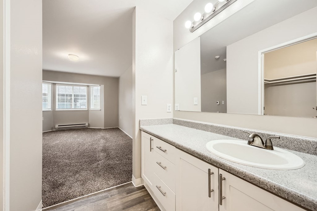 Primary bathroom in a two-bedroom two-bath apartment at Capitol City in Lacey, WA