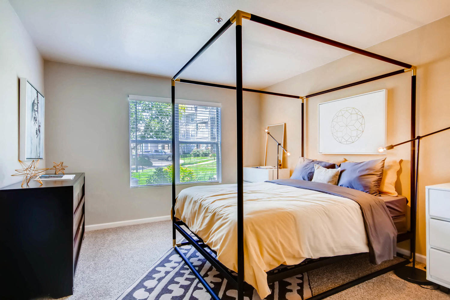 A bedroom at Eagles Landing at Church Ranch Apartments