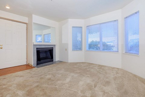 A Classic 2 Bedroom 2 Bath Living Room with Fireplace at Brookhaven Apartments in Federal Way, Washington