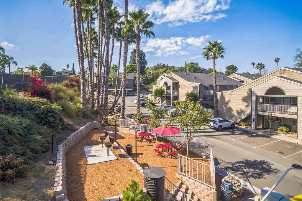 An aerial view of a BBQ & Picnic Area and property at Meadow Creek Apartments in San Marcos, CA