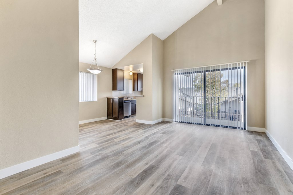 Step into serenity: Embrace the spacious living and dining areas, seamlessly connected to a private balcony at Independence Plaza. Your new home awaits, where relaxation meets modern luxury.