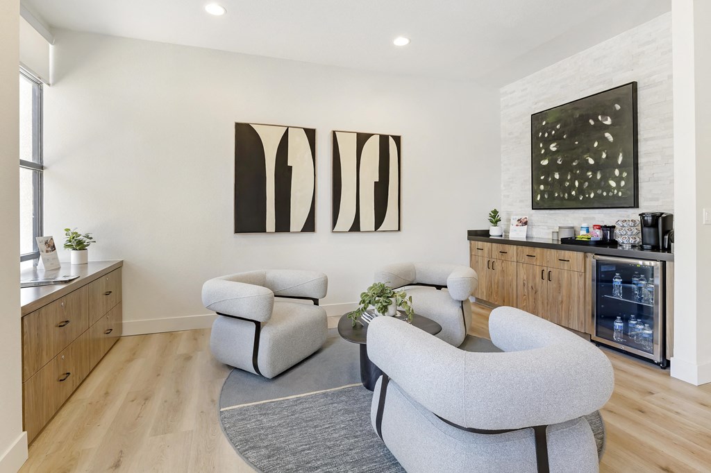 Our leasing office offers a cozy retreat with complimentary coffee and refreshing cool water, inviting you to relax and explore your new home sweet home.at The Michael B Townhomes and Flats, Las Vegas