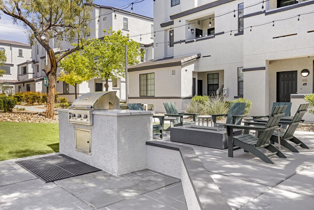Grill, chill, and unwind in style at the Michael B apartment complex's inviting outdoor patio, where good times and great food come together seamlessly.at The Michael B Townhomes and Flats, Las Vegas,