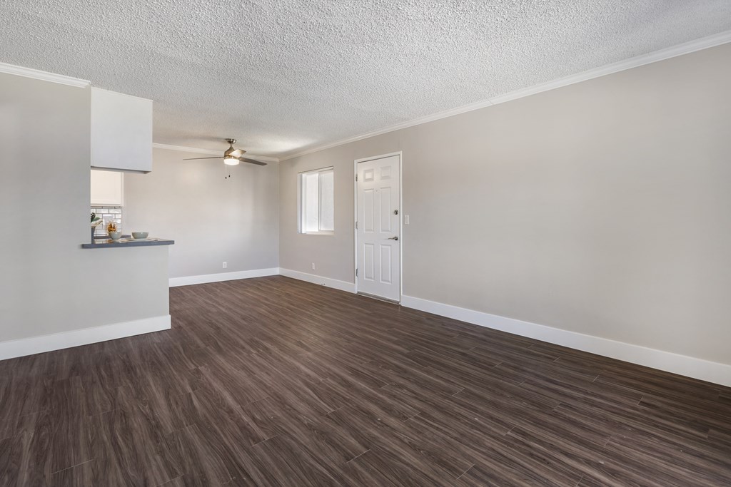 a living room area with a ceiling fan at Sage Creek Apartment Homes, Simi Valley, CA