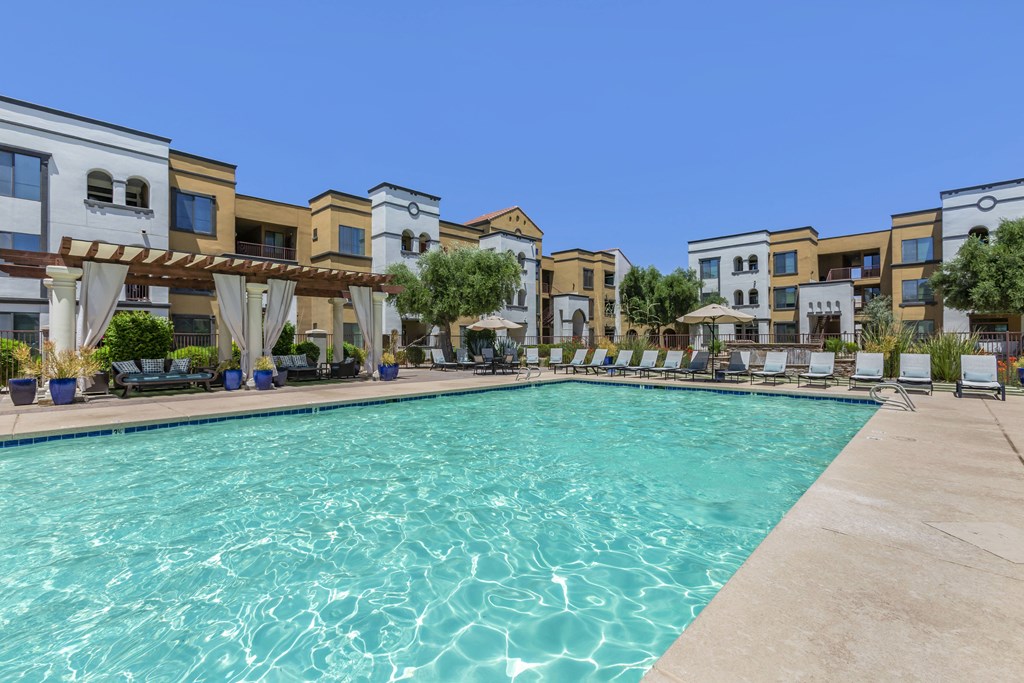 Treat yourself to a refreshing swim at Trevi Apartment Homes, where our amenities include a sparkling pool for your enjoyment at Trevi Apartment Homes, Chandler, 85224