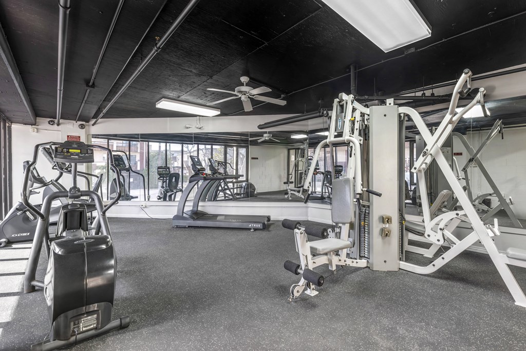 Feel the freedom of fitness under the comforting sway of the ceiling fan at Independence Plaza's state-of-the-art gym.