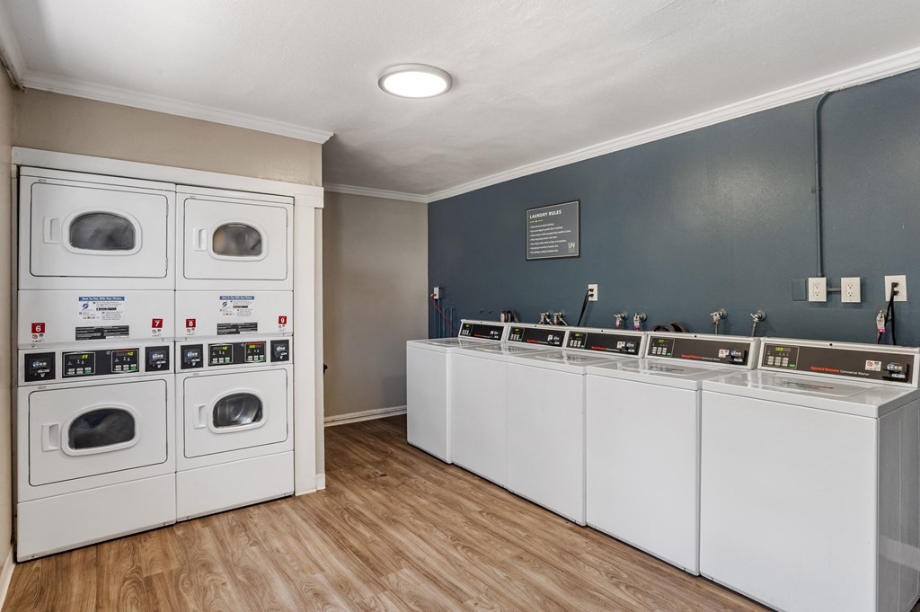 a laundry room with washers and dryers at Scripps Poway Villas, Poway, CA