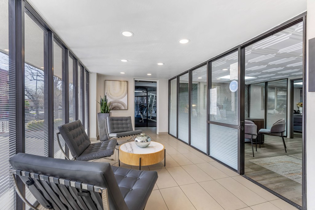 Step into comfort and convenience at Independence Plaza, where even the waiting room outside our leasing office feels like home sweet home.