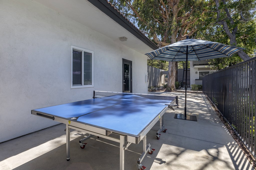 Ping Pong Table is offered near the covered area with foosball.at Sage Creek Apartment Homes, Simi Valley, 93063