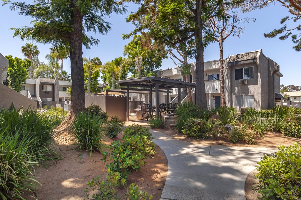 a courtyard with trees and plants at Scripps Poway Villas, California