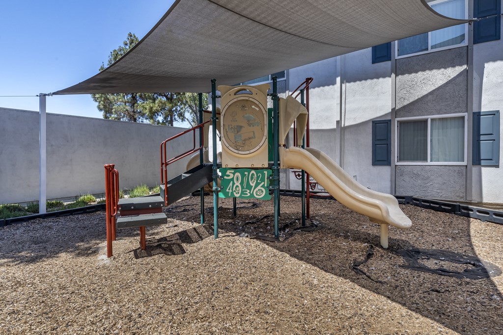 Shaded playground area at Sage Creek Apartment Homes, Simi Valley