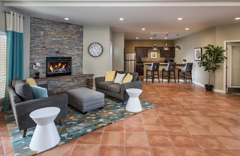 Leasing office fireplace and dining area at Aviara Apartments, Las Vegas, NV