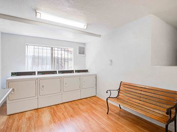 Convenient and clean laundry facilities at Cornerstone Apartments, 8609 De Soto Avenue.