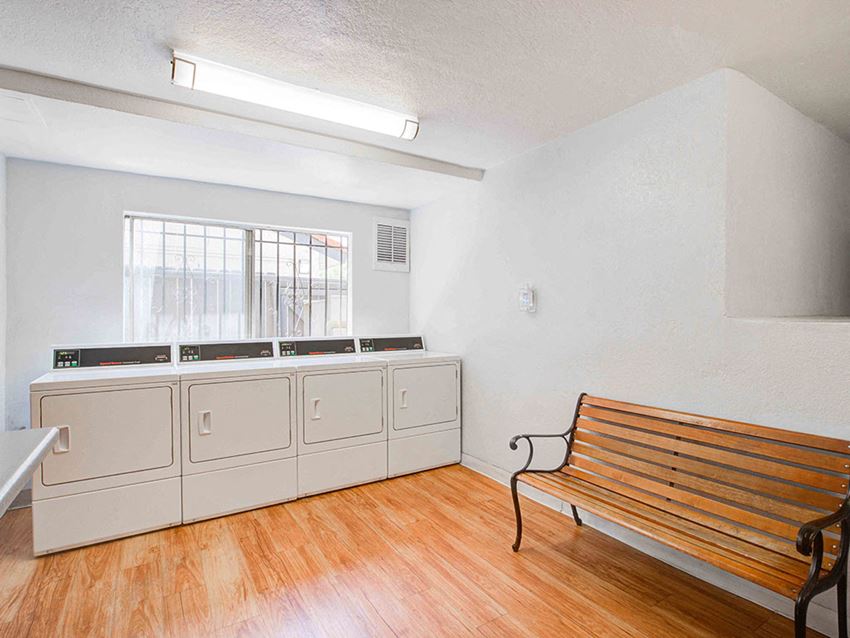 Convenient and clean laundry facilities at Cornerstone Apartments, 8609 De Soto Avenue.