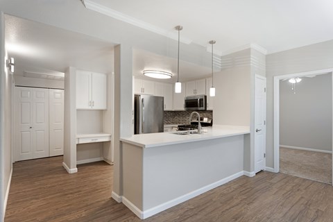 Our renovated units feature an open floor concept, creating spacious, modern living spaces designed for comfort and style at Ascent at the Galleria.