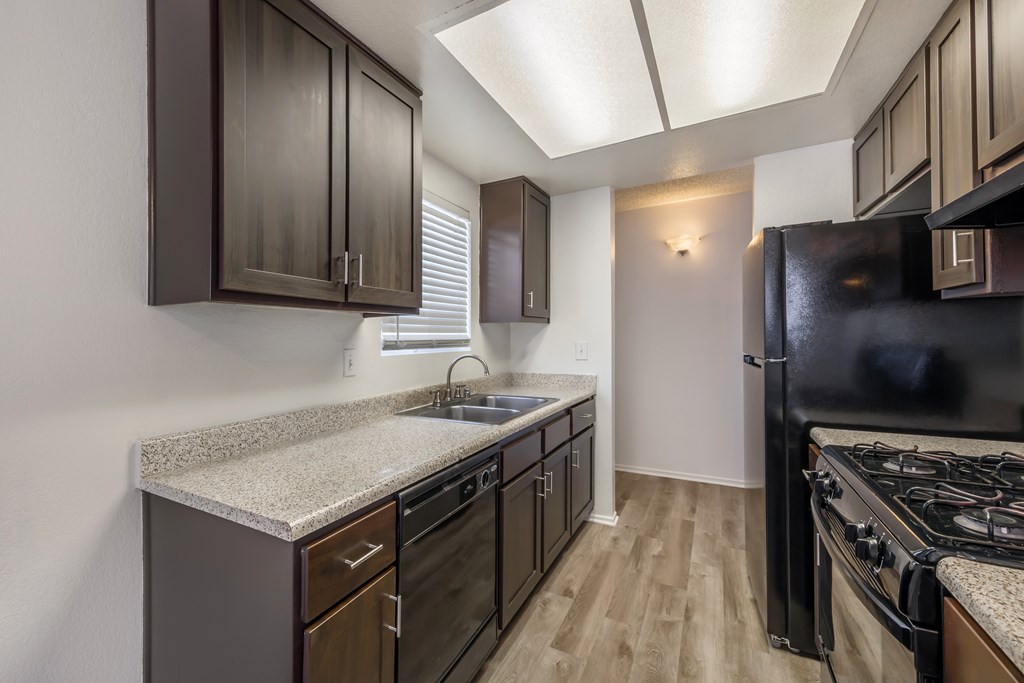 Sedona Apartments in Moreno Valley features renovated homes with modern flooring, updated cabinets, and stylish black appliances for a fresh, contemporary feel.