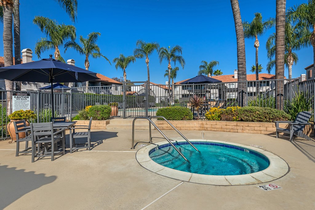 Sedona Apartments in Moreno Valley feature a renovated pool deck with a Jacuzzi and covered patio tables—perfect for relaxing or socializing in style.