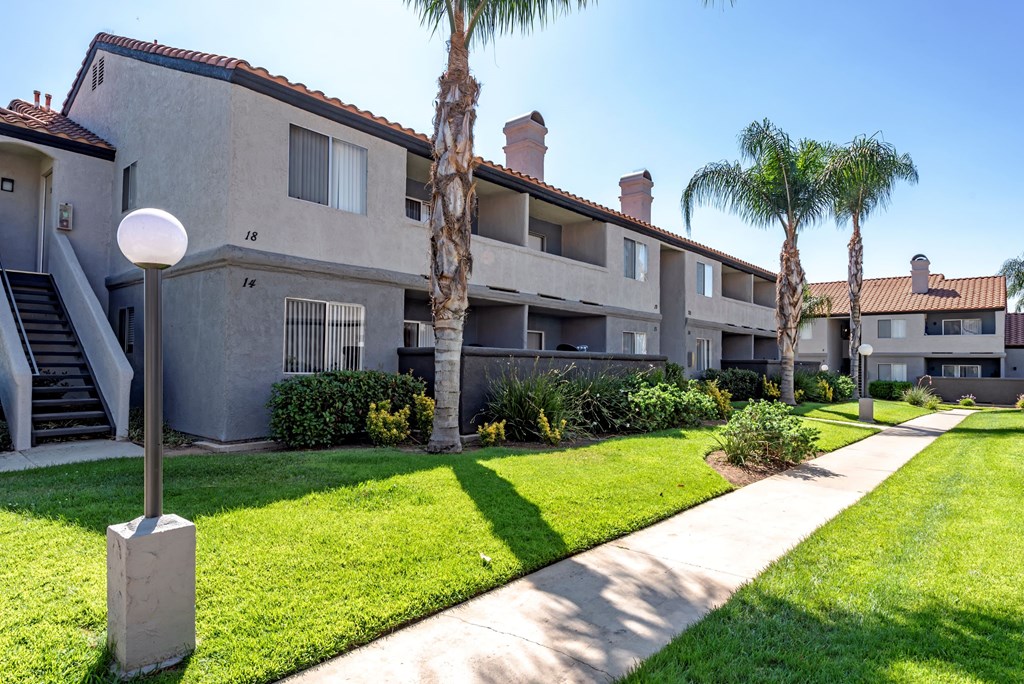 Sedona Apartments in Moreno Valley features freshly painted exteriors and beautifully manicured lawns, offering a vibrant, well-kept community to call home.