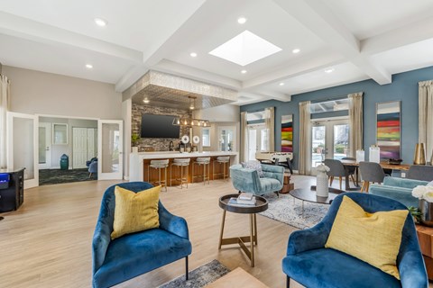 The leasing clubhouse welcomes all residents with plenty of seating and a cozy coffee bar—perfect for relaxing, socializing, or getting some work done.