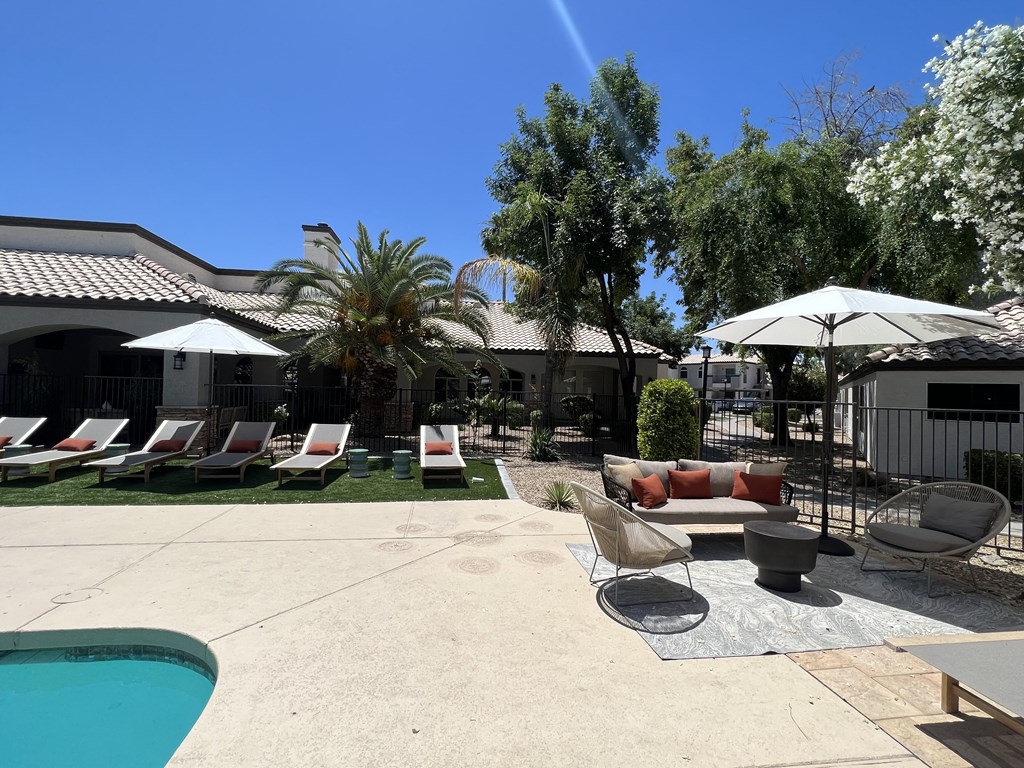 Revamped poolside loungers, adding a touch of excitement to your leisure time at Boulders at Lookout Mountain Apartment Homes, Phoenix, 85022