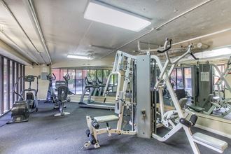 Fitness Center With Modern Equipment at Independence Plaza, Canoga Park, CA - Photo Gallery 4