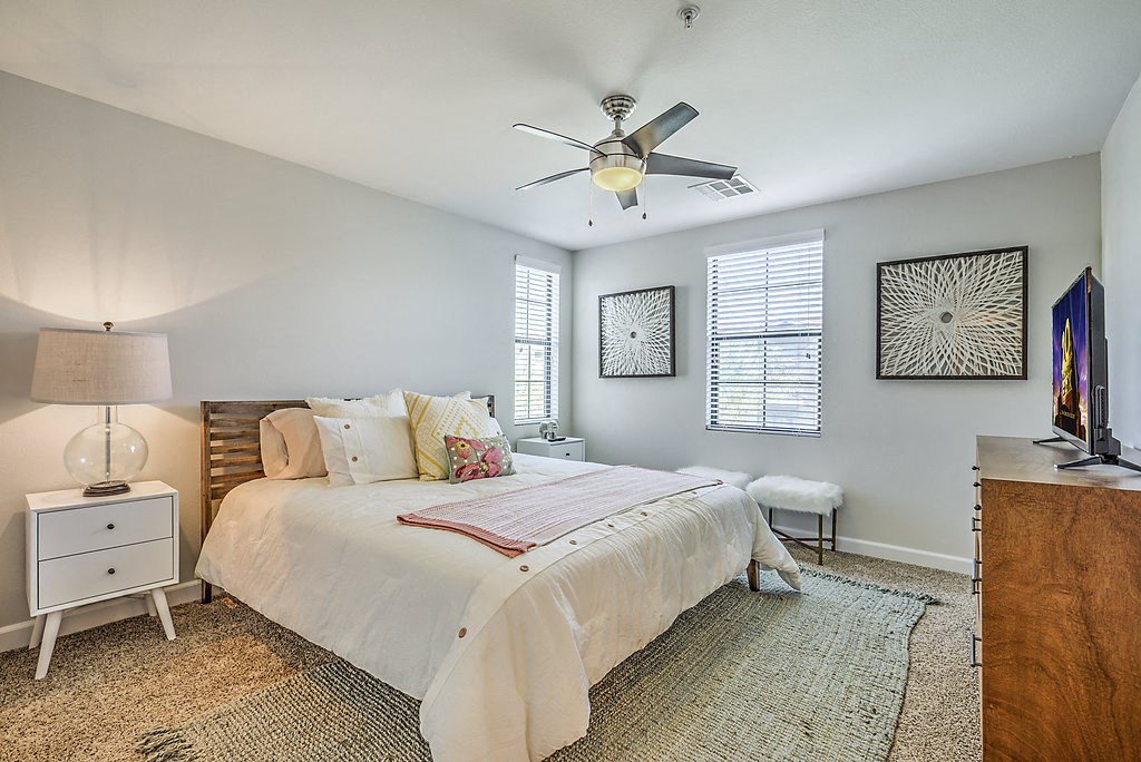 Step into comfort at The Michael B: Freshly painted walls, updated carpet, and a soothing ceiling fan make every moment serene.at The Michael B Townhomes and Flats, Las Vegas, 89148
