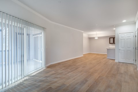 Large entry way with access to the patio. Allowing plenty of natural light to grace your future unit