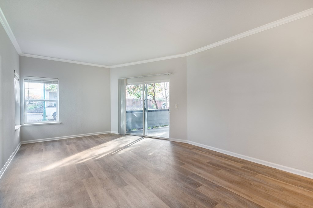 Large entry way with access to the patio. Allowing plenty of natural light to grace your future unit
