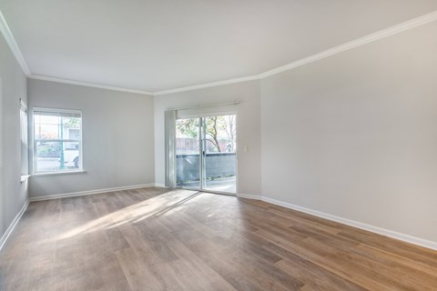 Large entry way with access to the patio. Allowing plenty of natural light to grace your future unit