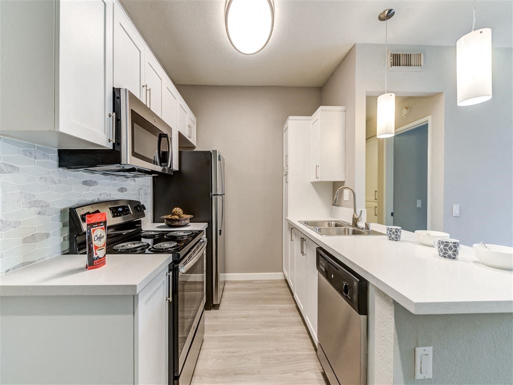Modern kitchen at The Summit at Chino Hills Apartment Homes in Chino Hills, CA 91709 Modern kitchen at The Summit at Chino Hills Apartment Homes in Chino Hills, CA 91709