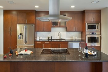 Westwood Luxury Apartments Wilshire Victoria Unit 502 Luxury Kitchen With Island Granite Countertops Upgraded Appliances - Photo Gallery 32