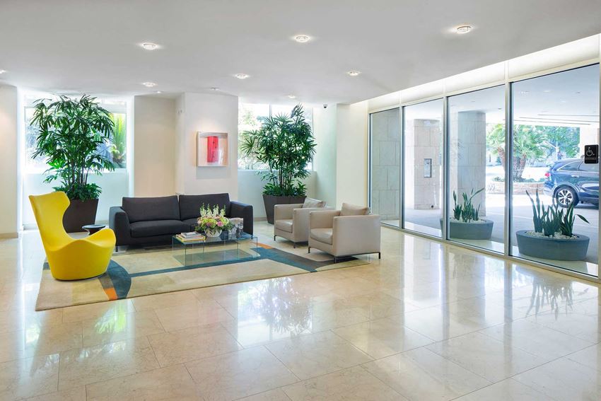 Lobby area with seating Westwood luxury apartments NMS Wilshire Margot Lobby area with seating at Wilshire Margot, Los Angeles, CA Lobby area with seating - Photo Gallery
