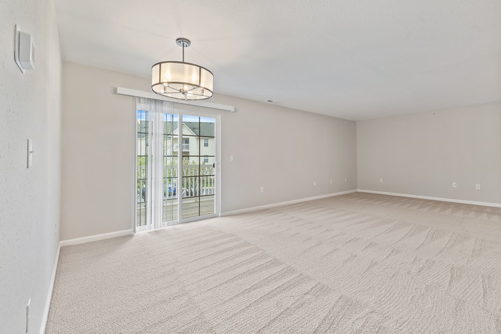 Large Living Room with Natural Light and new Fixtures and Hardware