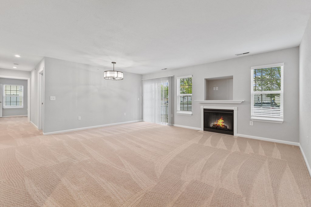 Living room floorplan options with a fireplace and lots of natural lighting