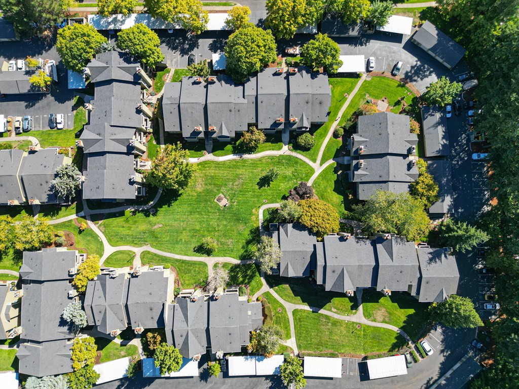 an aerial view of houses in a suburban neighborhood