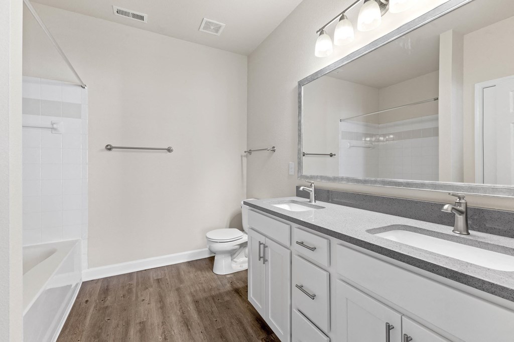 Master Bathroom with Double Sinks and Large Mirror