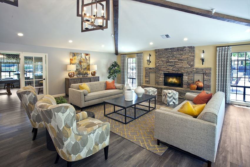Seating area with fire place inside the club house Seating area with fireplace at Club Pacifica, California