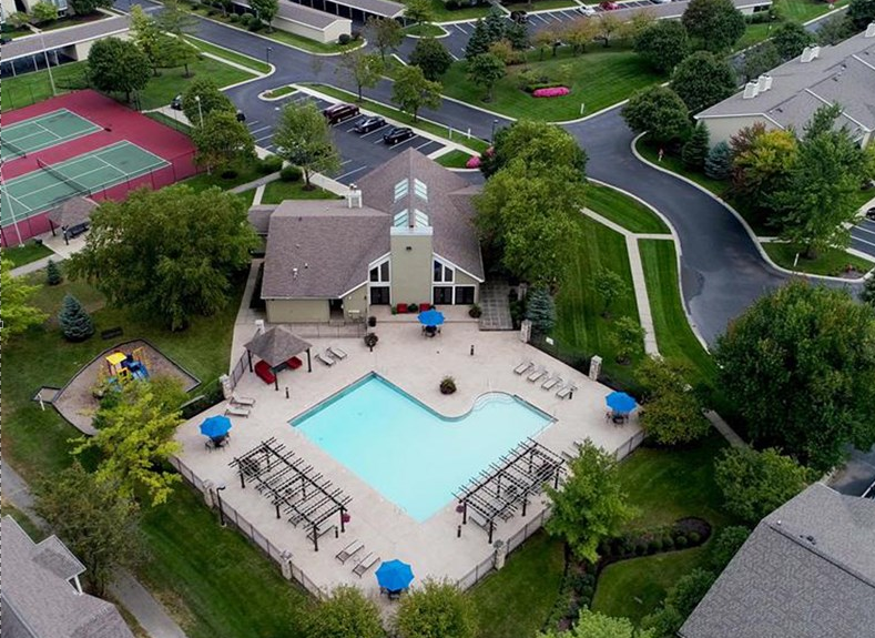 Crisp Pool and Lit Tennis Courts
