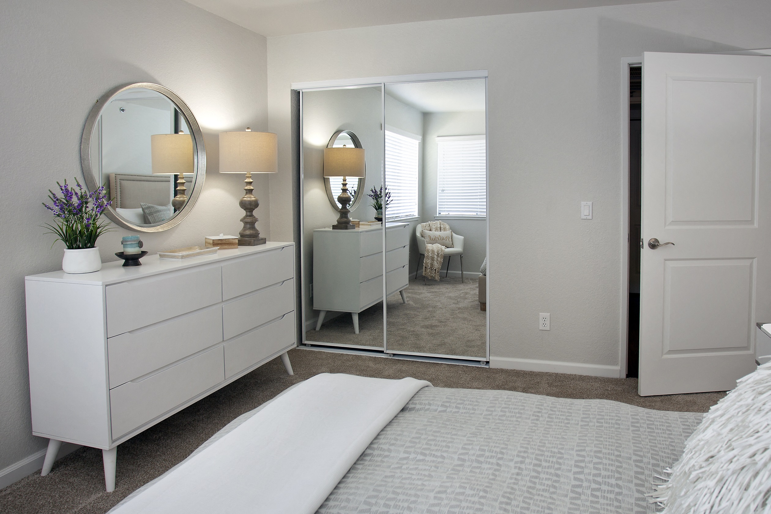 Large bedroom with mirror wardrobe doors at Club Pacifica, Benicia