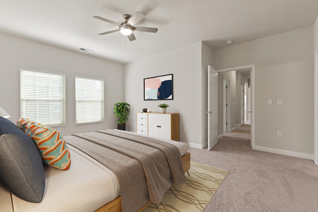 Primary Bedroom with Ceiling fans and extra Windows