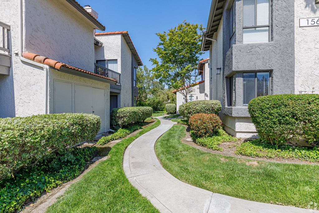 a walkway between two buildings at La Serena, San Diego, CA