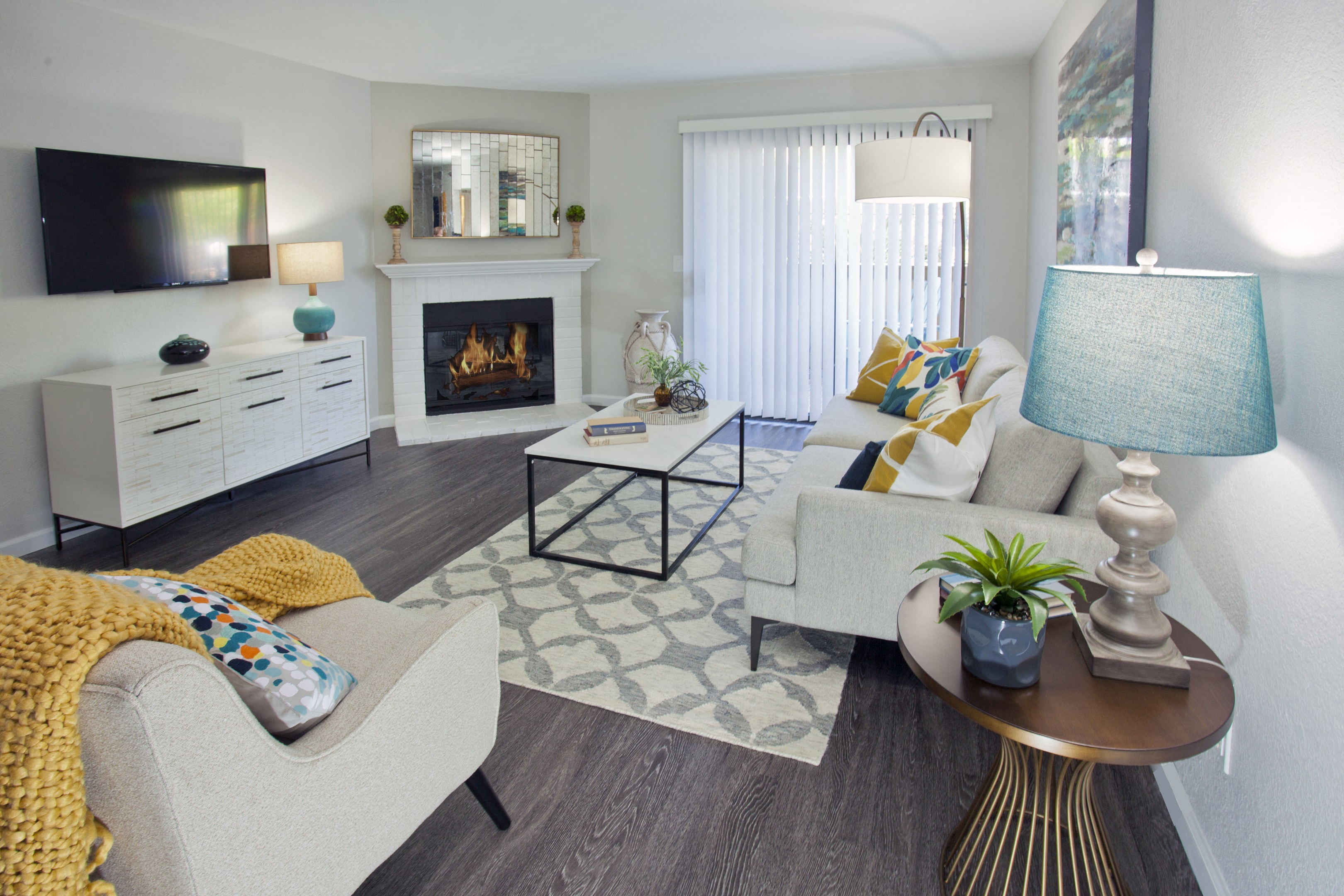 large living room with fireplace and patio at Club Pacifica, Benicia, CA
