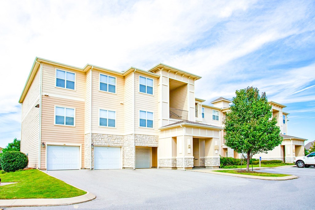 Exterior of apartment with view of parking garages at Sonoma Grande Apartments, Oklahoma