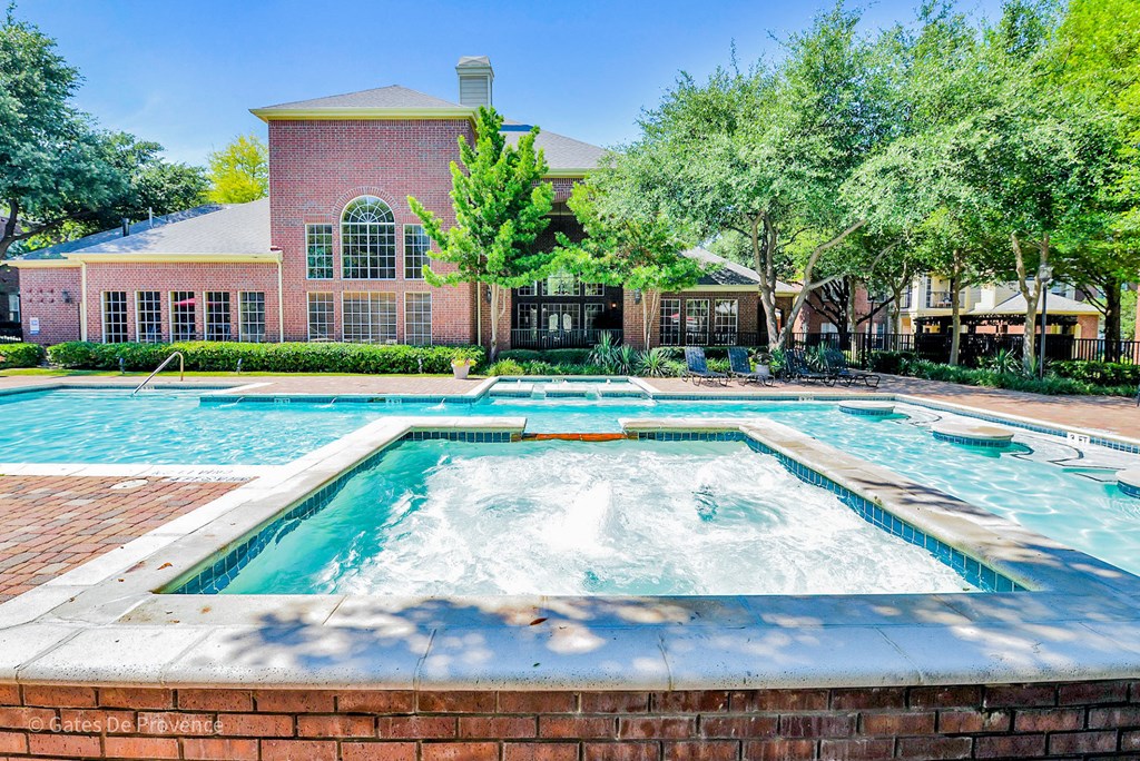 Resort-style pool and jacuzzi view at Gates de Provence Apartments, Texas, 75287