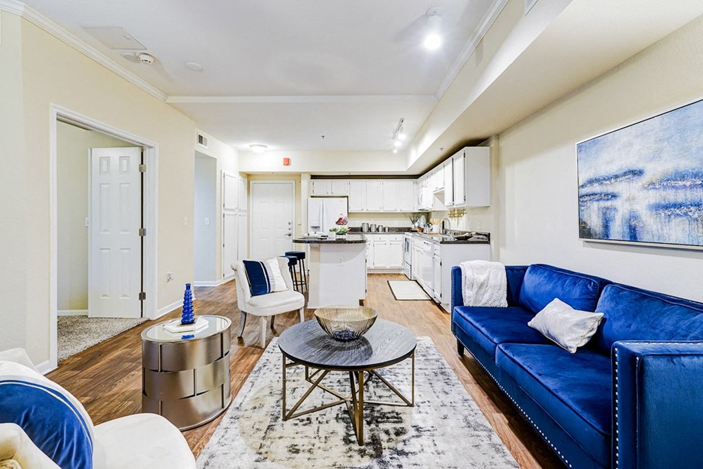 Living Area With Kitchen View at Villas at Katy Trail Apartments, Dallas, 75201