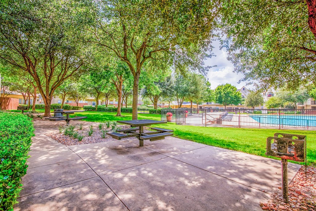 Outdoor seating in the courtyard  at Tuscany Square, Dallas