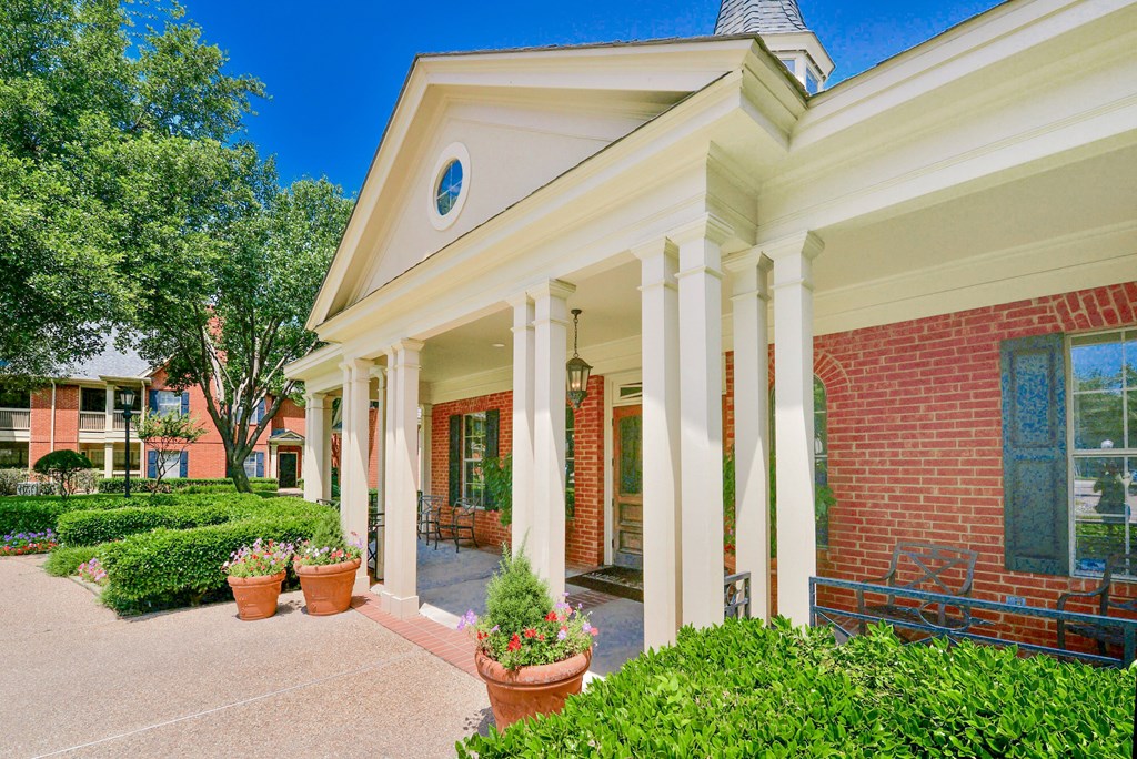 Leasing office entrance with plants at SaddleBrook Apartments, Dallas, Texas