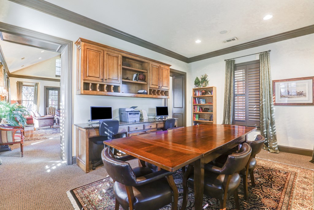 Wooden dining table and chairs at SaddleBrook Apartments, Dallas, TX, 75248
