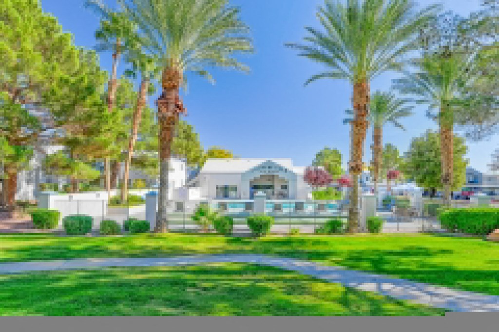 Lush landscaping and greenery at Country Club at The Meadows Senior Apartments in Las Vegas, NV, For Rent. Now leasing 1 and 2 bedroom apartments.